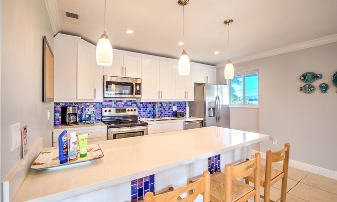 Marathon House | Boaters dream location! Walk to Coco Plum Beach! Deep Water Dockage! Updated!