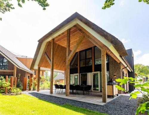 Wekerom House | Boerderij Villa met Binnenzwembad & Wellness - 12 personen - Resort Valley