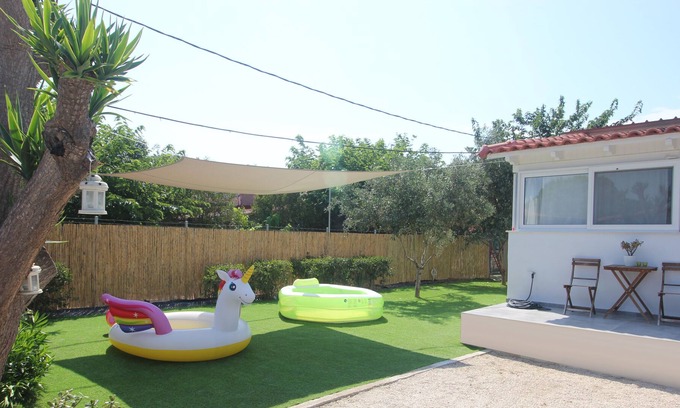 Skafidia House | Brand new house with garden, next to the beach.