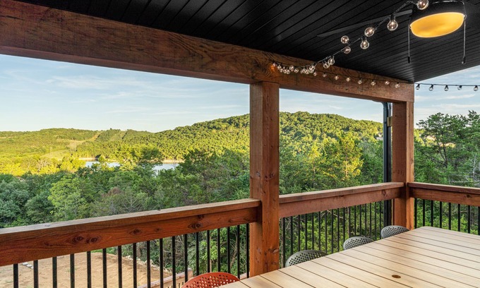 Hollister House | Brand New! Lake View with Hot Tub & Arcade Game Room! Indoor and Outdoor Pool!