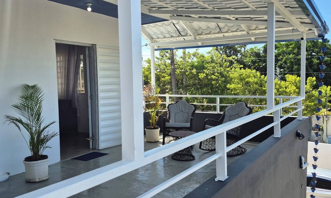 Nagua Apartment | Breezy 2-bedroom apartment in a quiet Nagua Suburb with AC and private parking