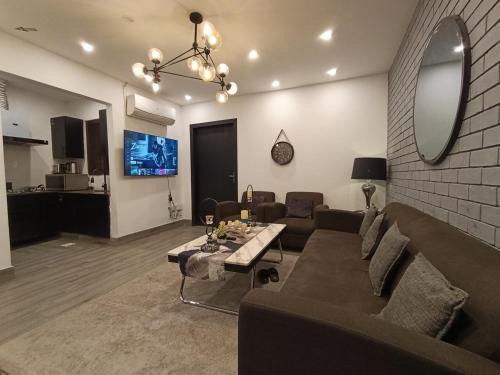 Bahria Town Apartment | Brick Accent Loft 1BHK with Balcony & Free Netflix