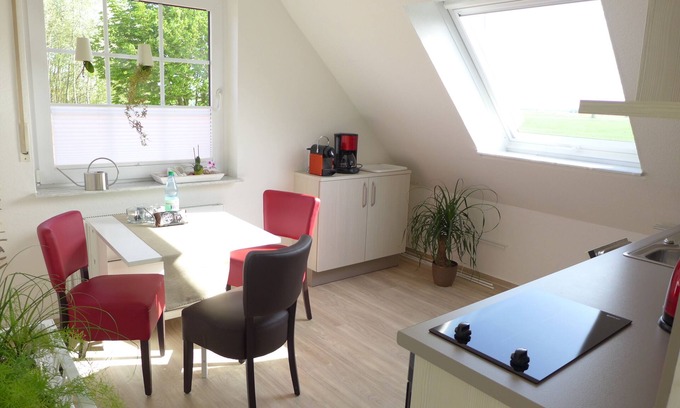 Norddeich Condo | Bright, friendly top floor apartment with WLAN, 15 min. walk to the beach.