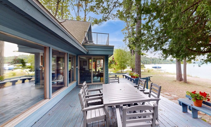 Maple City House | Bright & spacious home on Sandy Tamarack Cove with beach & dock access & firepit