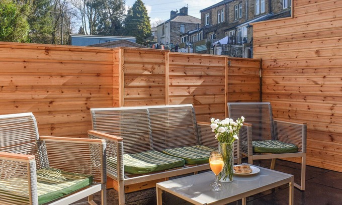 Burnley Cottage | Brun terrace offers a perfect blend of elegance and comfort.