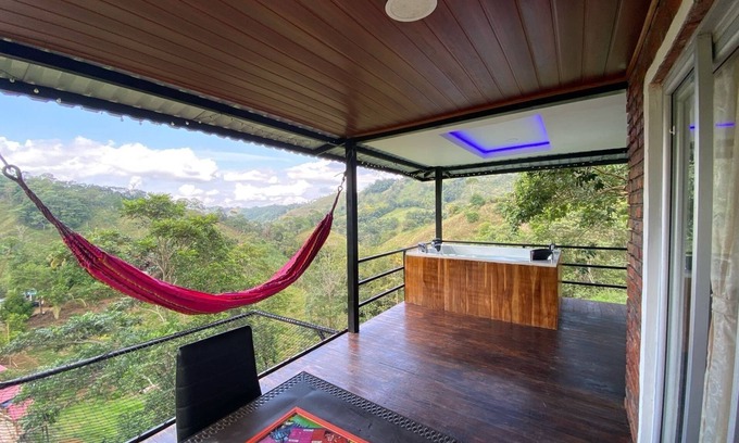 Samana Ski Chalet | Cabin in Norcasia Jacuzzi, spring water pool and extreme attractions option.