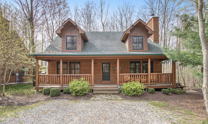 Saugatuck Cabin | Cabin tucked in the trees with private hot tub & lake/pool access