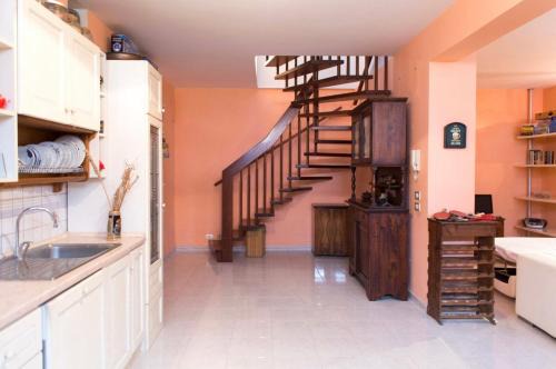 Nettuno House | Camera privata con cucina