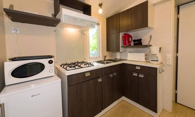 Brissac-Quince House | Camping de l'Etang Sites and Landscapes * - Cottage Comfort 2 ch - TV 6 persons