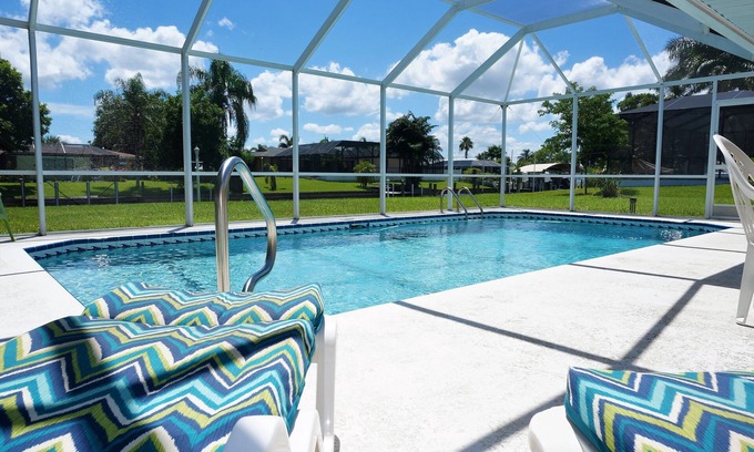 Yacht Club House | Casa Clara - 2 Bedroom, 2 Bath Vacation Home with Electric Heated Pool on Gulf Access Canal
