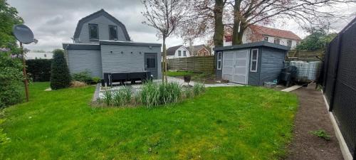 Koewacht House | Casa del huts