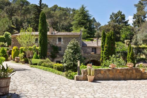 Mont-Ras House | CASA EL MOLI DE CAN BURJATS con piscina y chimenea