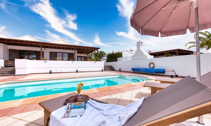 Puerto Calero Ski Chalet | Casa Guayre - Private Pool, BBQ, Air-Con and Ping-Pong By Lanzarote Vacation Homes