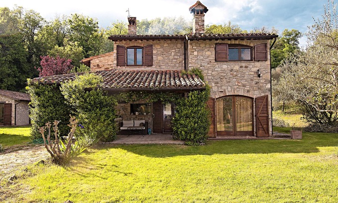 Monte Castello di Vibio Villa | Casale chimneys immersed in olive trees