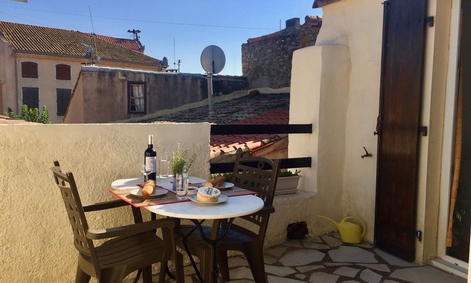 Olonzac House | Centre of Olonzac, market views, 2 bedrooms & private sunny rooftop terrace