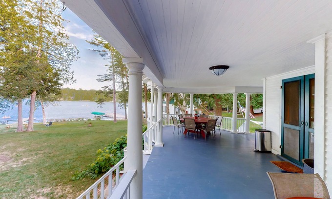 Charlotte Cottage | Century-old lakefront Victorian on a private island with boats & beach - dogs OK