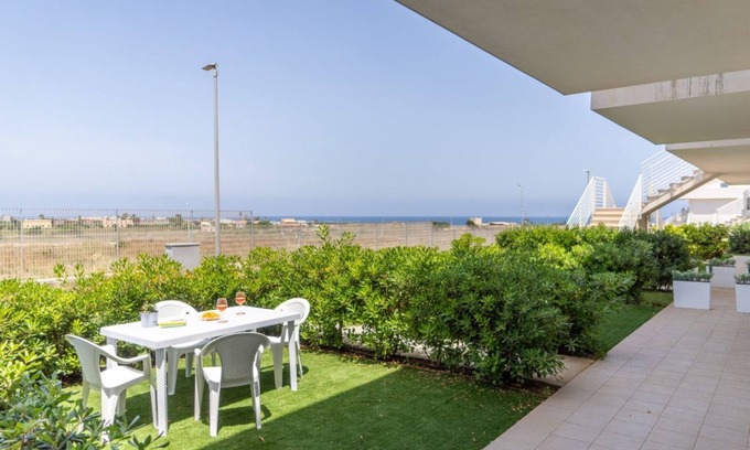 Pachino Apartment | Charming 75 sqm seaview apartment on two levels, for 5 people, located inside the renowned Borgo 84 residence, equipped with swimming pool and cycle path. The property is located just 3 km from the center of Marzamemi, one of the most fascinating seaside
