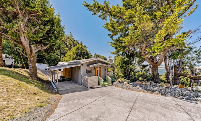 Gold Beach House | Charming coastal home with water views, large covered deck