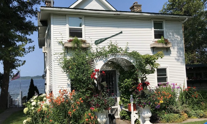 Traverse City Cottage | Charming, cozy cottage 10 feet from water's edge on Lake Leelanau.