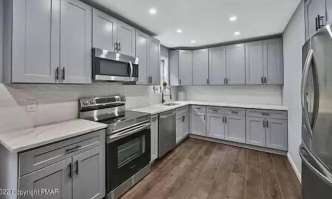 East Stroudsburg House | Charming Family Home With Fire Pit, Pool Table, Arcade, Darts &Foosball