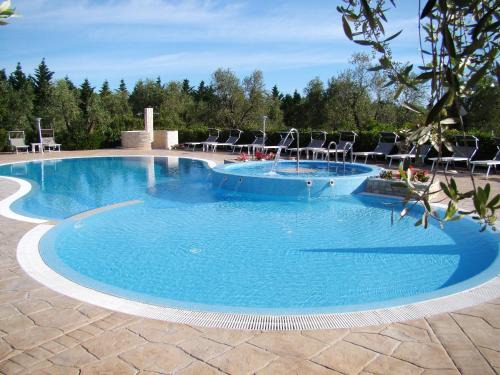 Chiesiola House | Charming House in Vieste with Shared Pool and Terrace