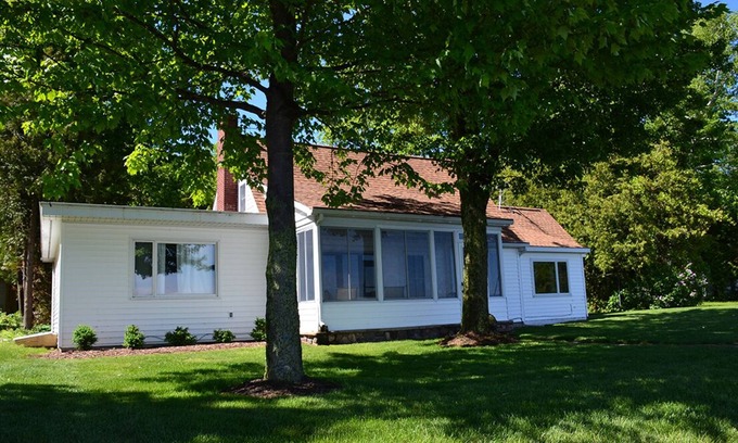 Northport Cottage | Charming Northport home on Lake Michigan. Fire pit. Dog ok.
