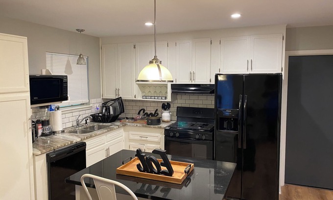 Pine Bluff House | Cheerful 3-bedroom with parking - Pet friendly