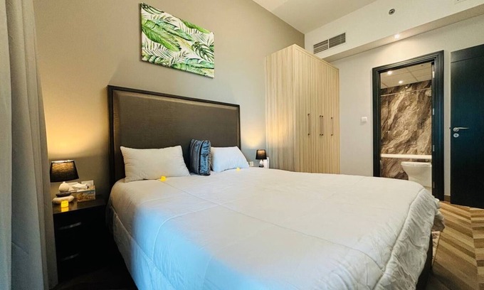 Business Bay Apartment | Chic 1-bedroom apartment in enchanting Dubai with WiFi, AC, fitness room
