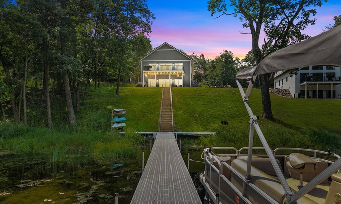Pine River House | Chic Lakefront Escape- Hot Tub, Pier, & Kayaks