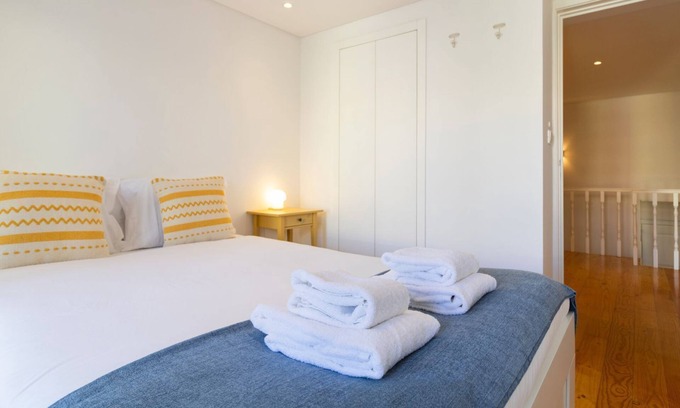 Centro / Baixa Apartment | City Center Duplex w/Patio by LovelyStay