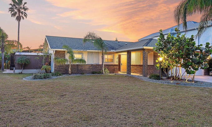 Palm Harbor House | Coastal Canal Front Retreat with Pool & Hot Tub