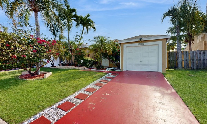 Whisper Walk House | Colorful dog-friendly home with pool, grill, work desks, internet, AC, & W/D