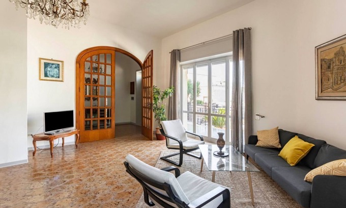 Giorgilorio Apartment | Comfortable 100 sqm apartment, perfect for a stay of four people, located on the mezzanine floor of a building (accessible by steps).The property is located in Surbo, in the province of Lecce, in an area equipped with every comfort and service. Lecce cit