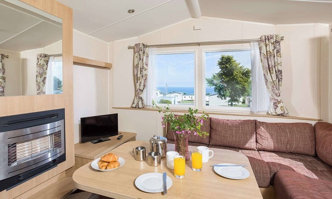 Looe House | Comfortable family caravan with one double and one twin.
