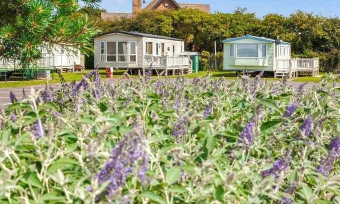 Chapel Saint Leonards Cottage | Comfortable bungalow with one double and one twin.