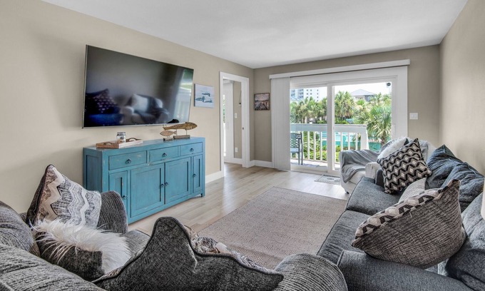 Villa Sabine Condo | Community Pool-Walk 2 Beach-Covered Balcony-Pier-2BR Deepwater Cove 103