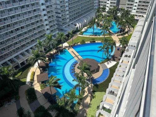 Barangay 76 Apartment | Condo with Balcony, Pool View, near MOA, NAIA Airport at Shell Residence