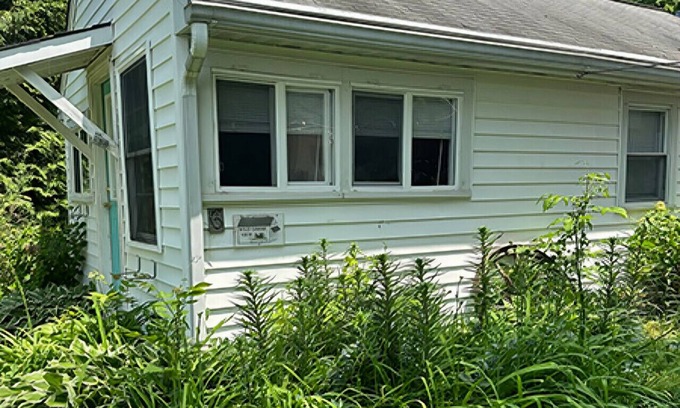 St. Michaels Cottage | Cottage #6 Wild Goose on the left of Main House