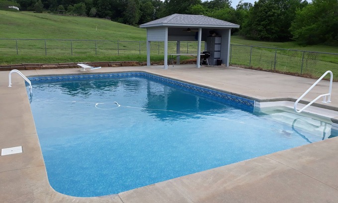 Checotah House | Country lake retreat with Pool and Boat Dock!nCozy + food/attractions nearby!