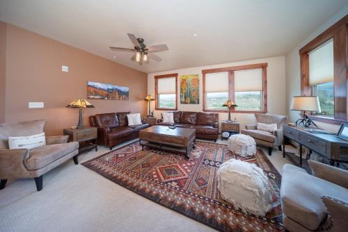 Fraser House | Cozens Pointe Building I Unit I201 by Stay Winter Park