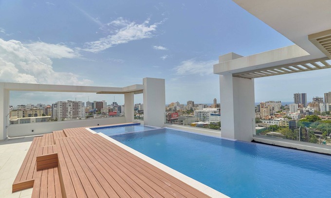 Ensanche Quisqueya Apartment | Cozy 1-bedroom apartment in charming Santo Domingo with AC, fitness room