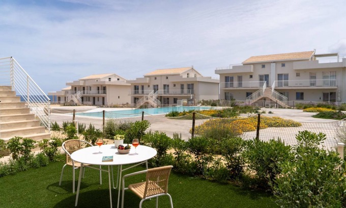 Pachino Apartment | Cozy 40 sqm seaview flat, able to accommodate up to 3 people, located inside the renowned Borgo 84 residence, equipped with swimming pool and cycle path. The property is located just 3 km from the center of Marzamemi, one of the most fascinating seaside