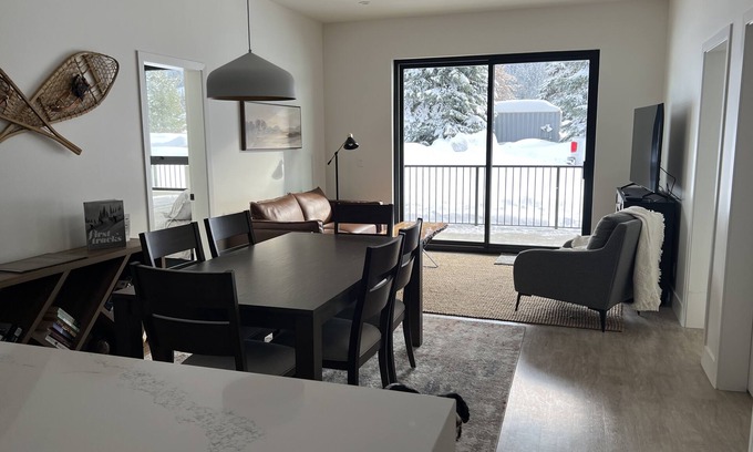 Revelstoke Condo | Cozy & bright mountain getaway. Enjoy a soak after a hard day's play!