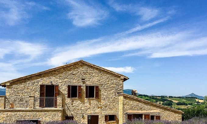 Apiro Villa | Cozy country house with infinity pool and surrounded by sunflowers .