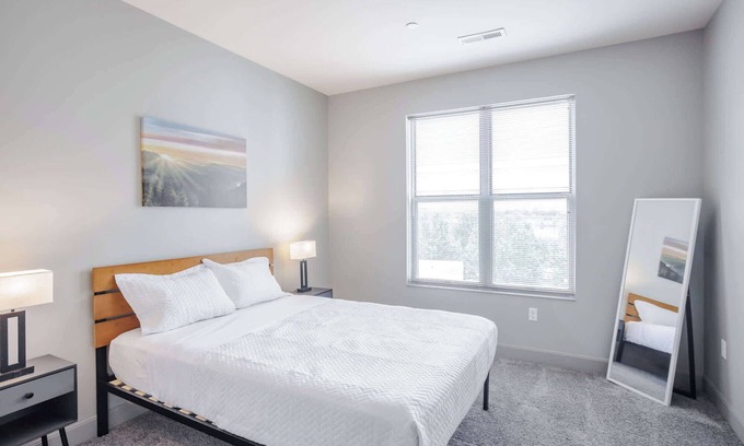 Central Business District Apartment | CozySuites at the Banks gym, pool 02