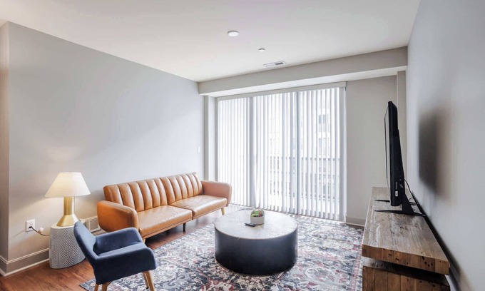 Central Business District Apartment | CozySuites at the Banks gym, pool 13