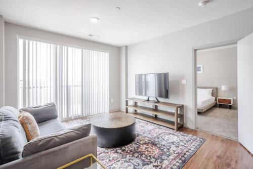 Downtown Cincinnati Apartment | CozySuites at the Banks gym pool 14