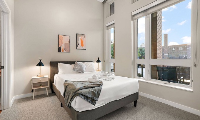 Downtown Minneapolis Apartment | CozySuites Marquee | pool, gym #11