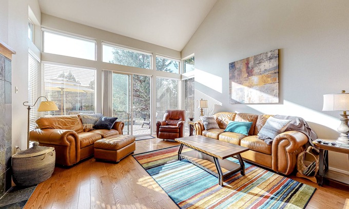 Redmond House | Creekside home with private hot tub & fireplace - access to pools, hot tub, gym