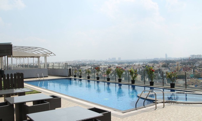 Koramangala Hotel | Davanam Sarovar Portico Suites Bengaluru